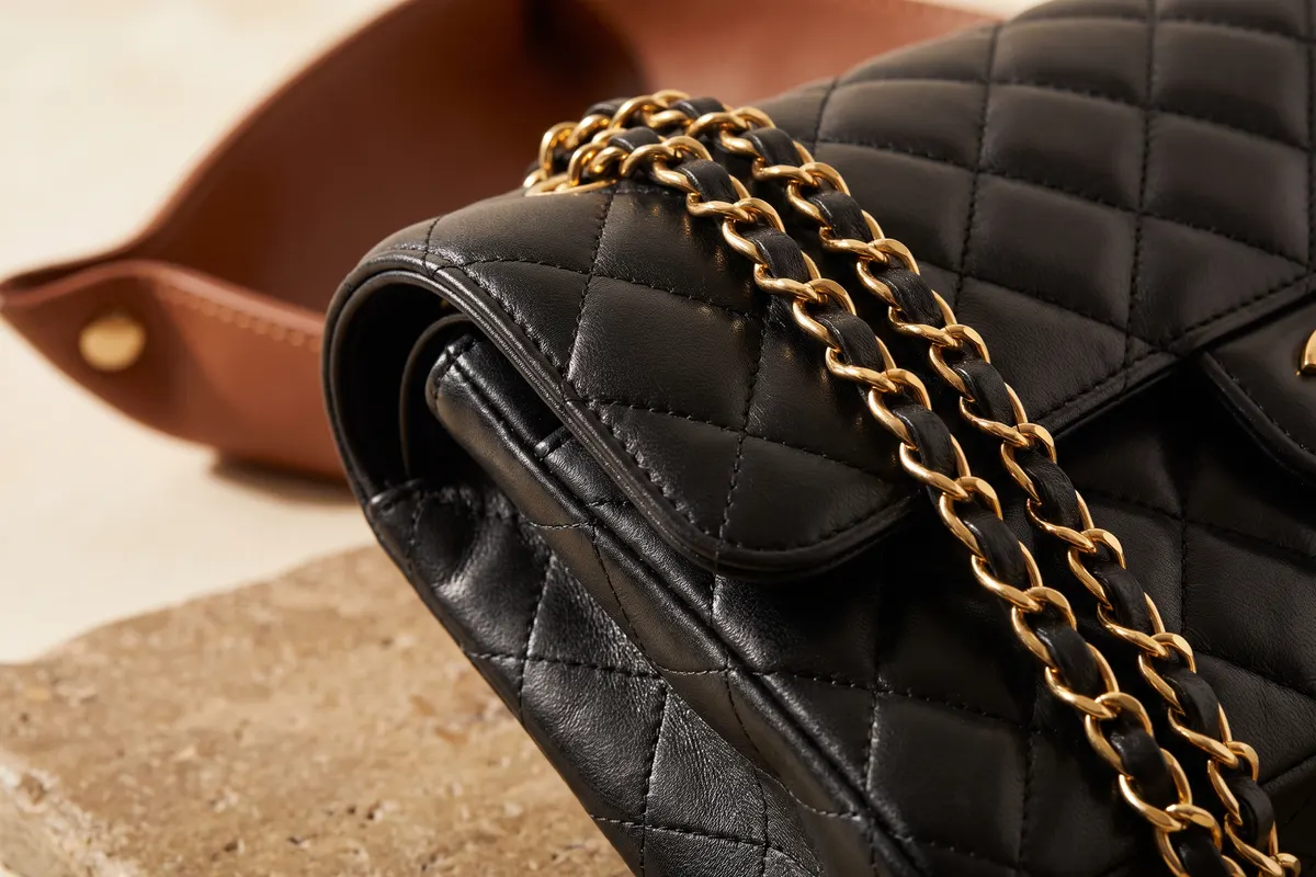 Chanel classic flap bag quilting detail: diamonds aligned across the flap and a leather-threaded chain