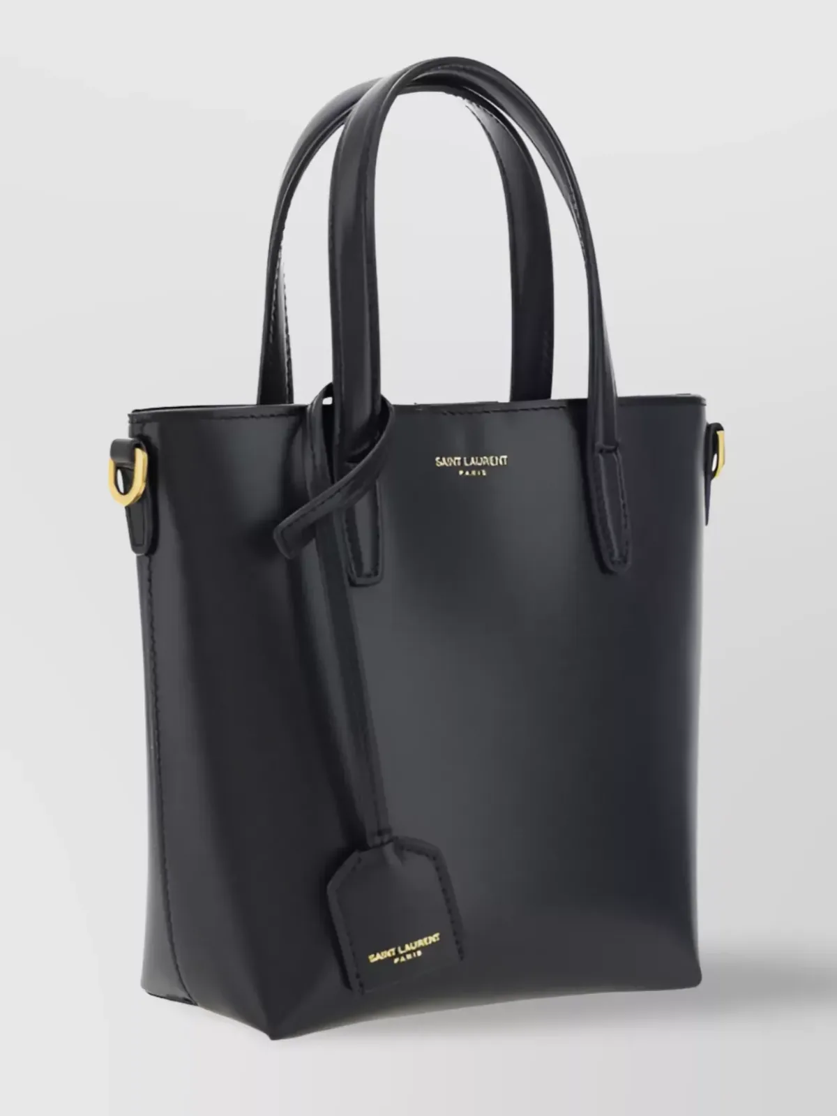 Saint Laurent Cassandre Mini nera, portachiavi in pelle ed etichetta staccabile