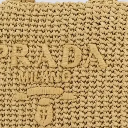 Prada mala de ombro tecida em bege, pormenor
