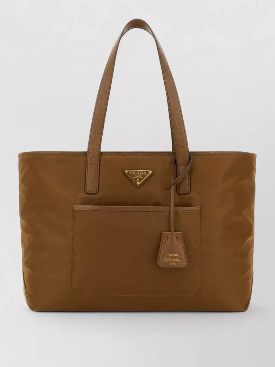Prada Re-Nylon Top Handle Bag in Brown, photo 1