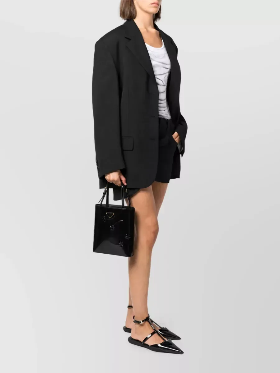 Prada Triangle Embossed Clutch in Black, photo 2