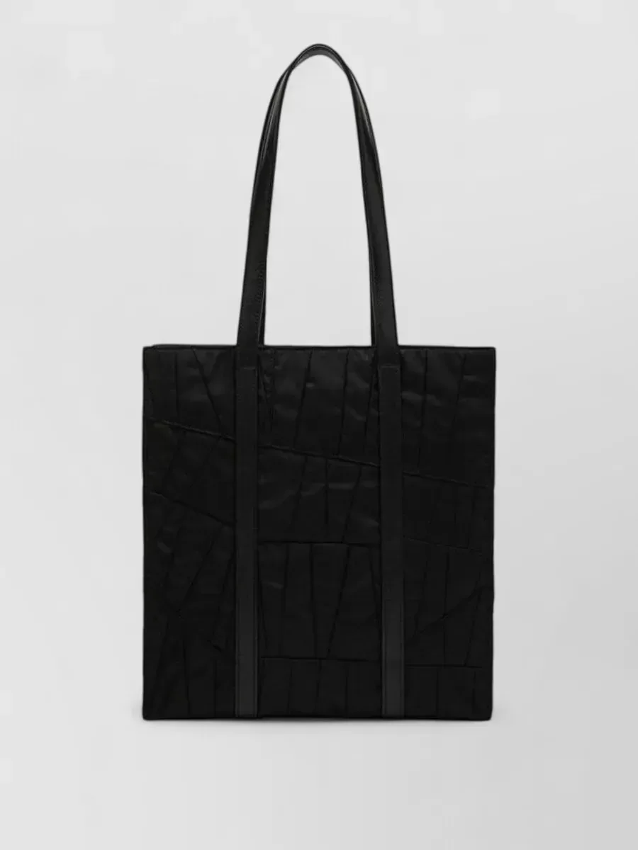 Prada Re-Nylon medium quilted tote bag in black nylon with shoulder handles