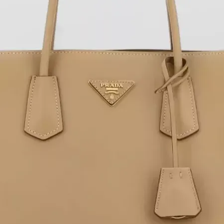 Prada Smooth Leather Top Handle Bag in Tan, detail