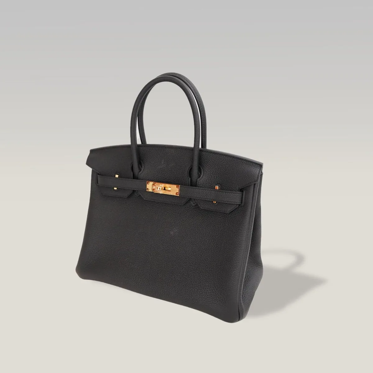 Hermès Birkin 30 in black Togo leather with gold hardware, the most versatile of the Birkin sizes