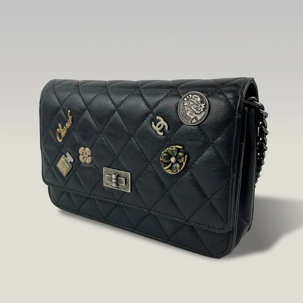 Chanel 2.55 Wallet on Chain in Black Quilted Lambskin with Charms and Chain