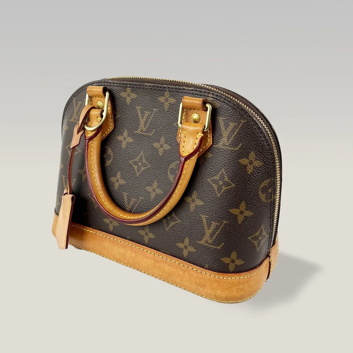 Louis Vuitton Alma BB in Monogram Canvas with Natural Leather Trim