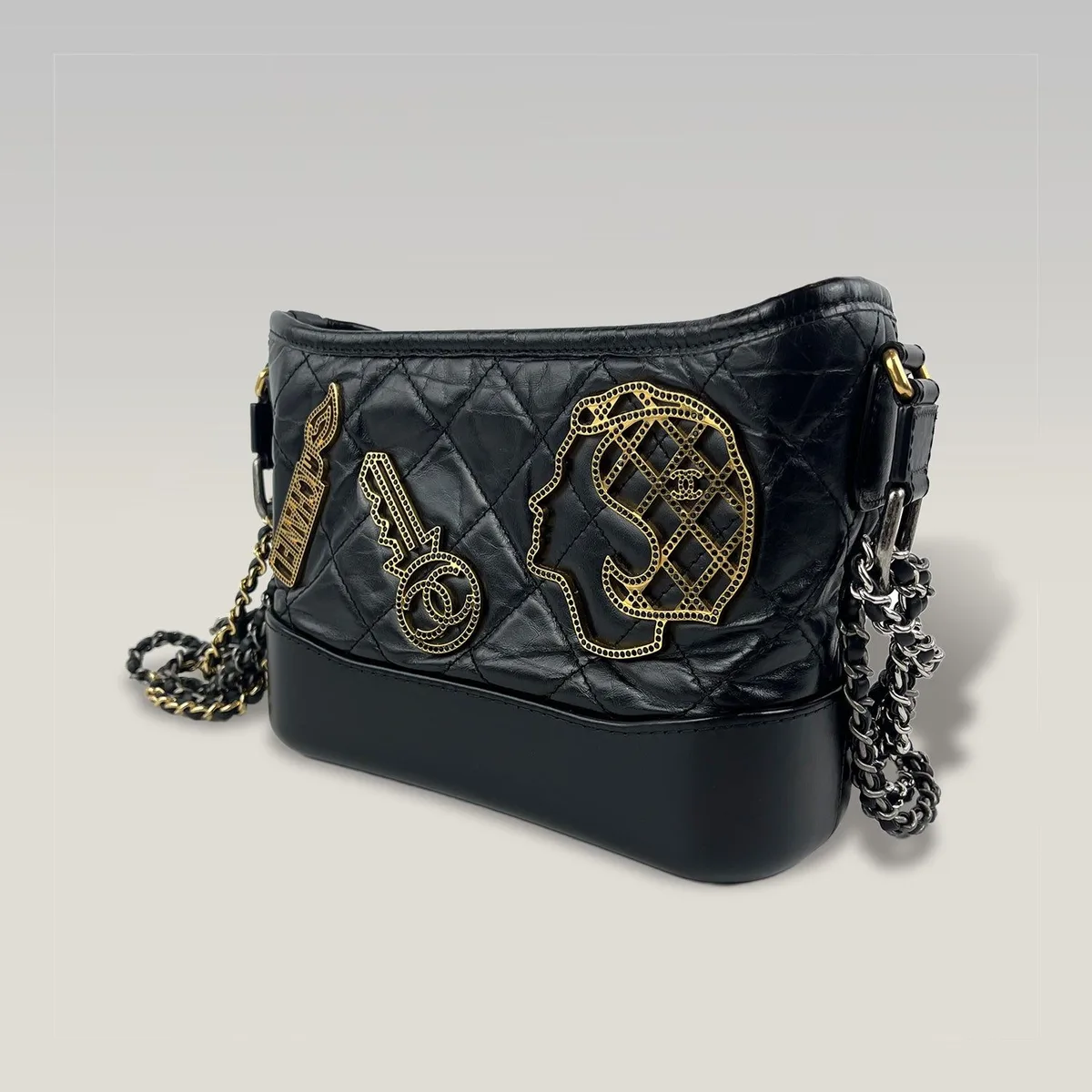 Pre-owned Chanel Gabrielle bag, the small hobo in black quilted leather with ruthenium and gold-tone chains