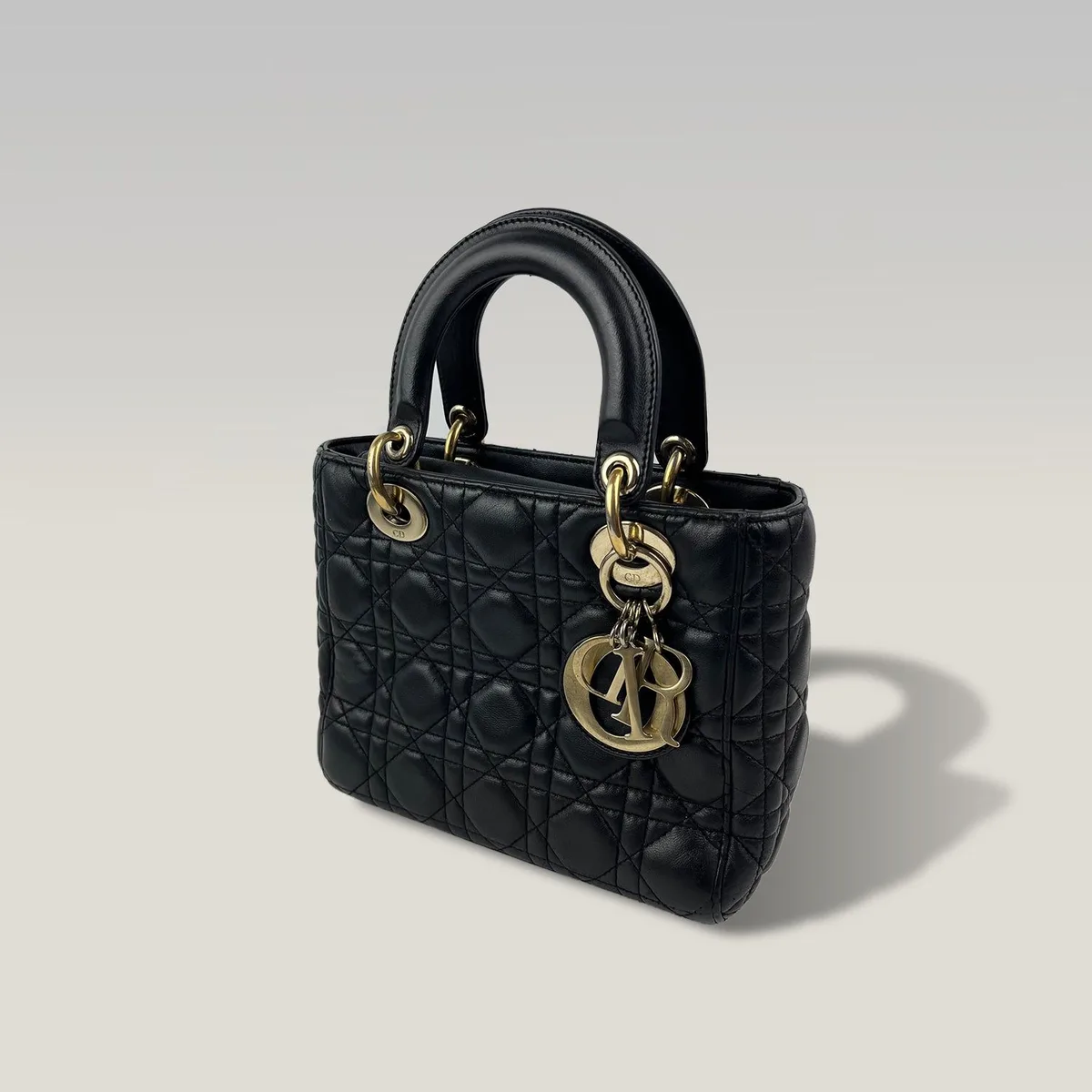 Dior Lady Dior Small in Black Cannage Lambskin with Gold-Tone Hardware and D.I.O.R. Charms