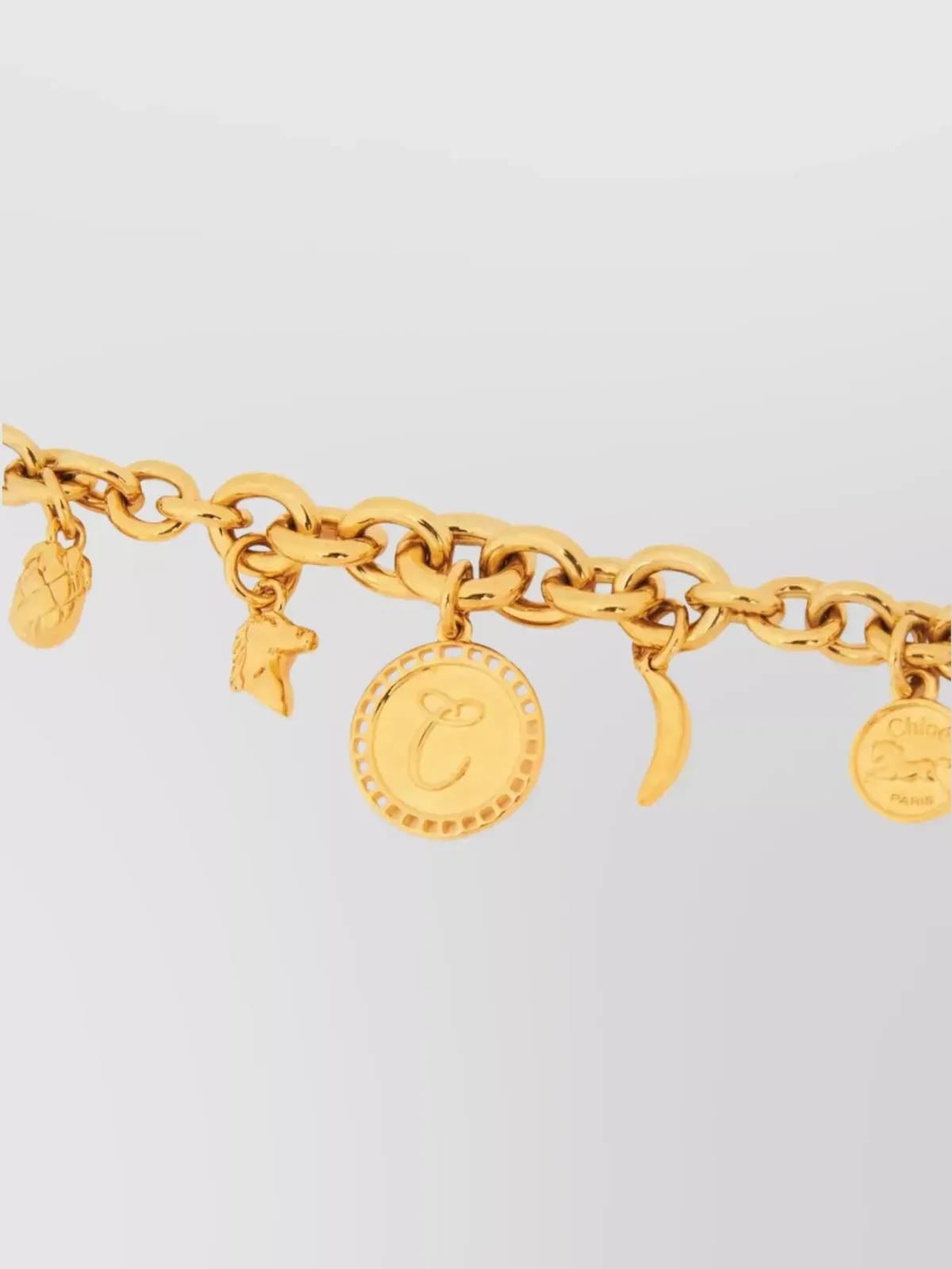 Pulseira Chloé com amuletos dourada, foto 2