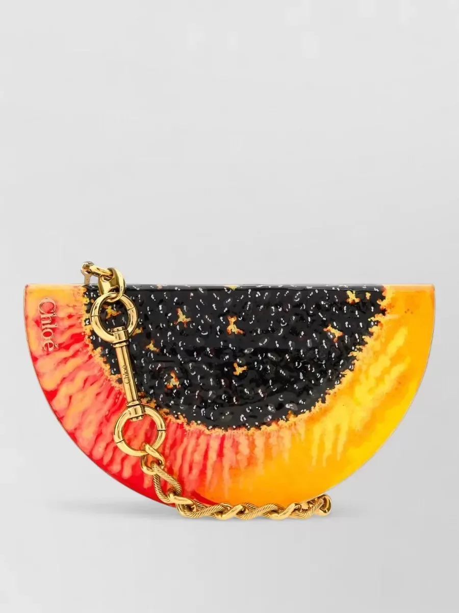 Chloé Metal Half-Moon Clutch en naranja, foto 1